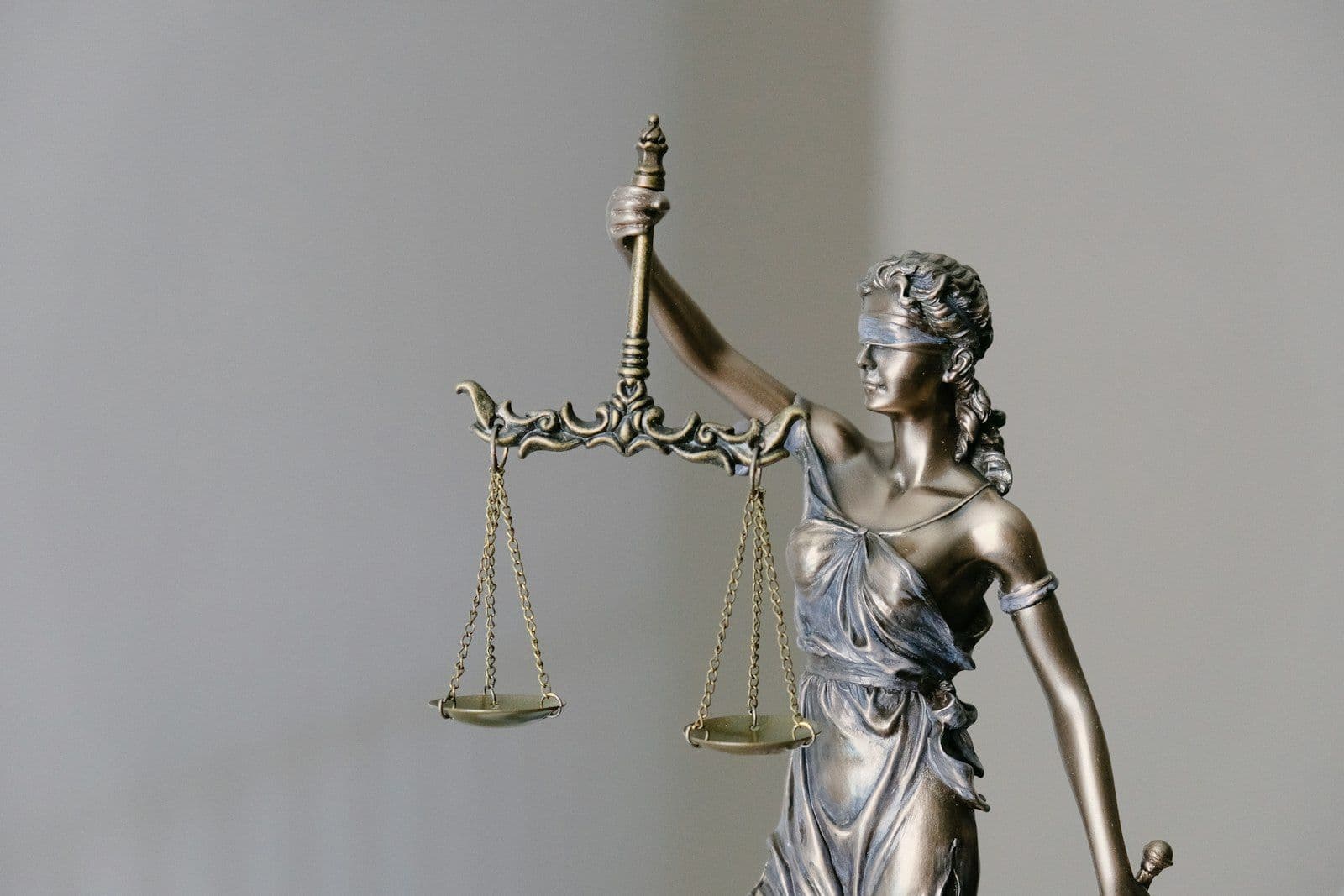 Judge's gavel on a desk, illustrating the choice between bankruptcy and debt settlement.