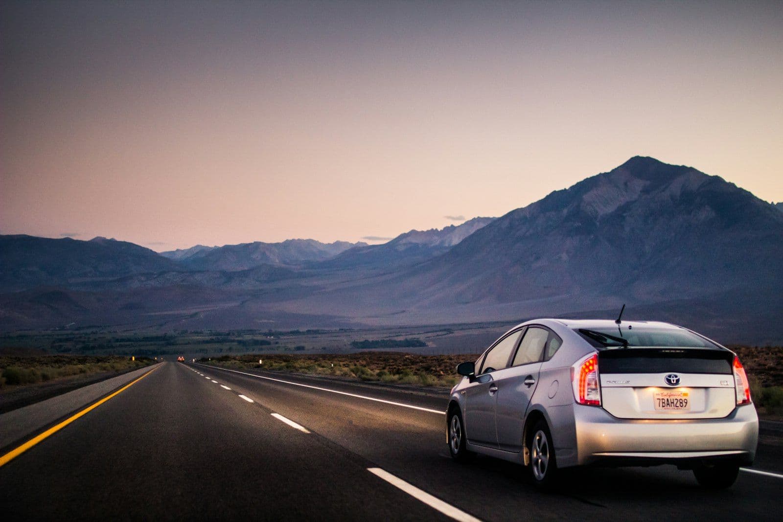 Car on the road, illustrating how credit-based insurance scores shape auto premiums.