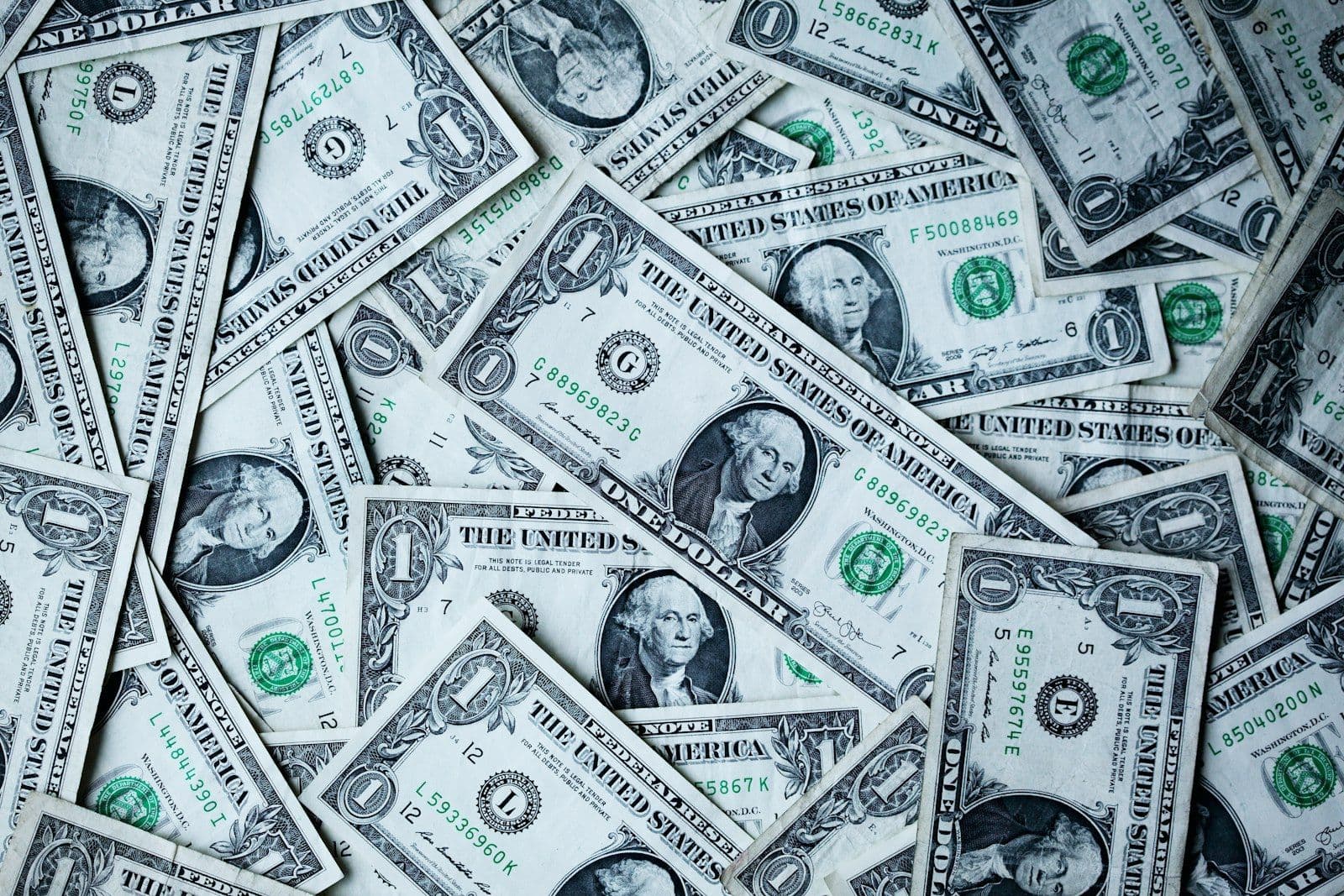 1 U.S.A dollar banknotes, illustrating why Credit Repair Companies Charge $2,400/Year for Letters Anyone Can Send.