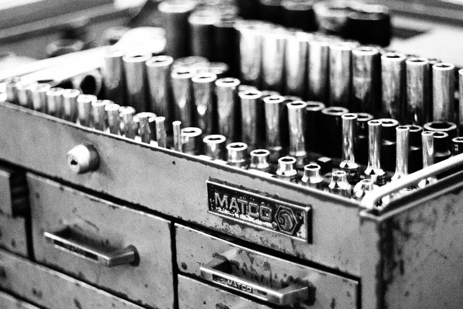 A set of hand tools in a workshop, illustrating self-directed credit repair.