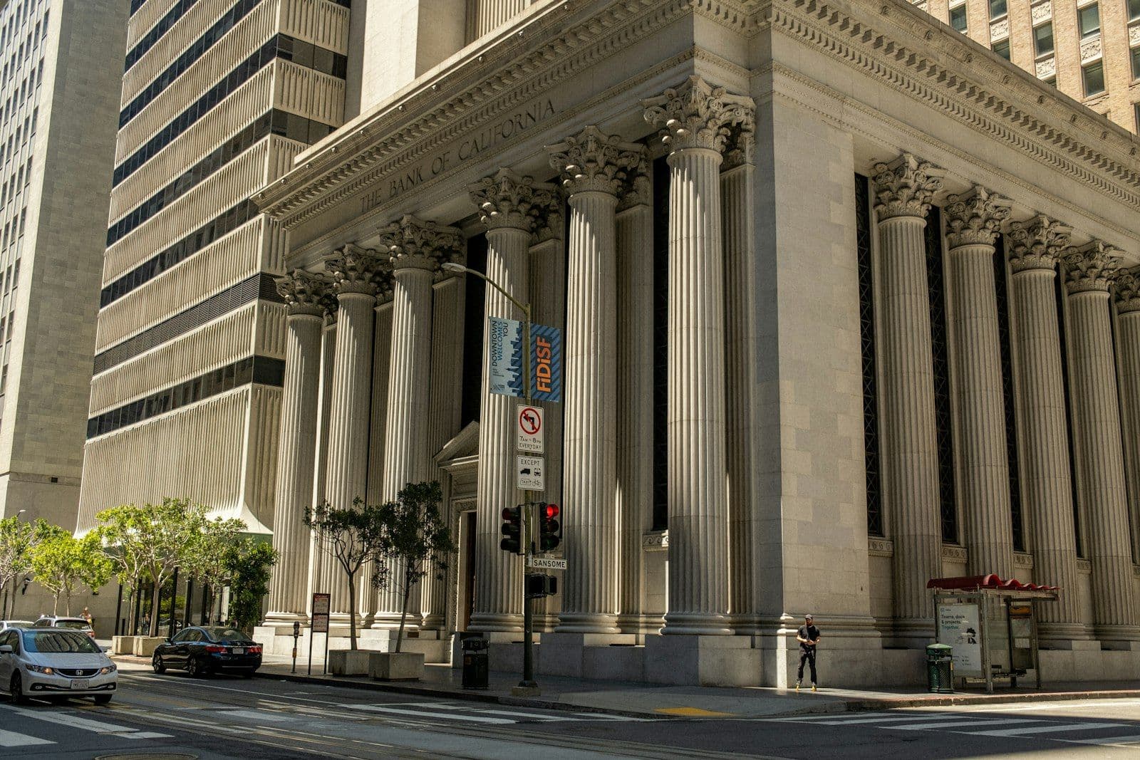 Classical bank building columns, representing the ChexSystems banking history report.