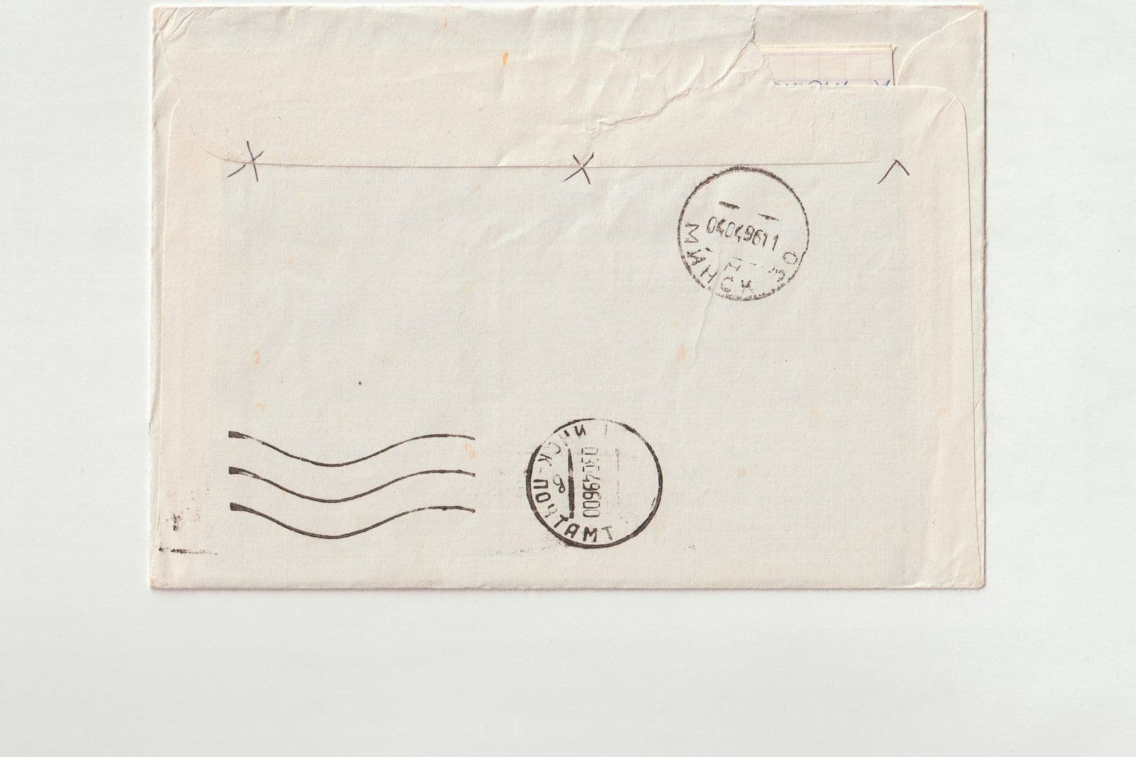 An envelope resting in a mailbox, illustrating sending a collection dispute letter.