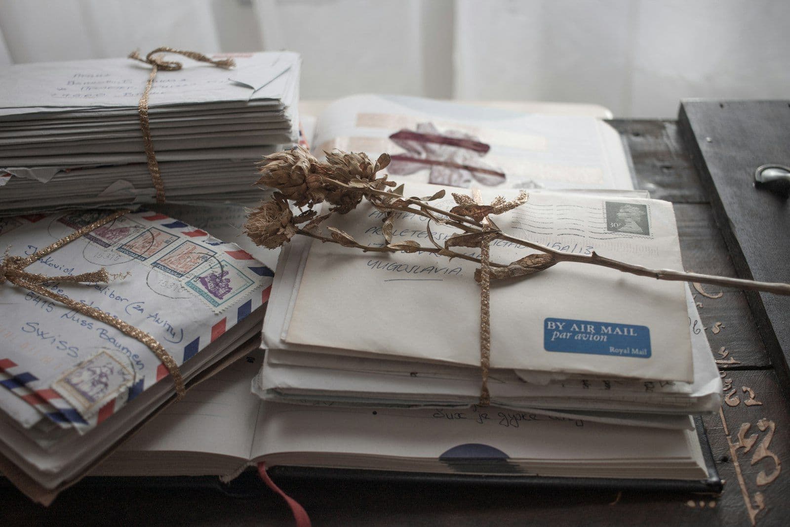 White and blue book on white paper, illustrating how to Remove a Collection From Your Credit Report.