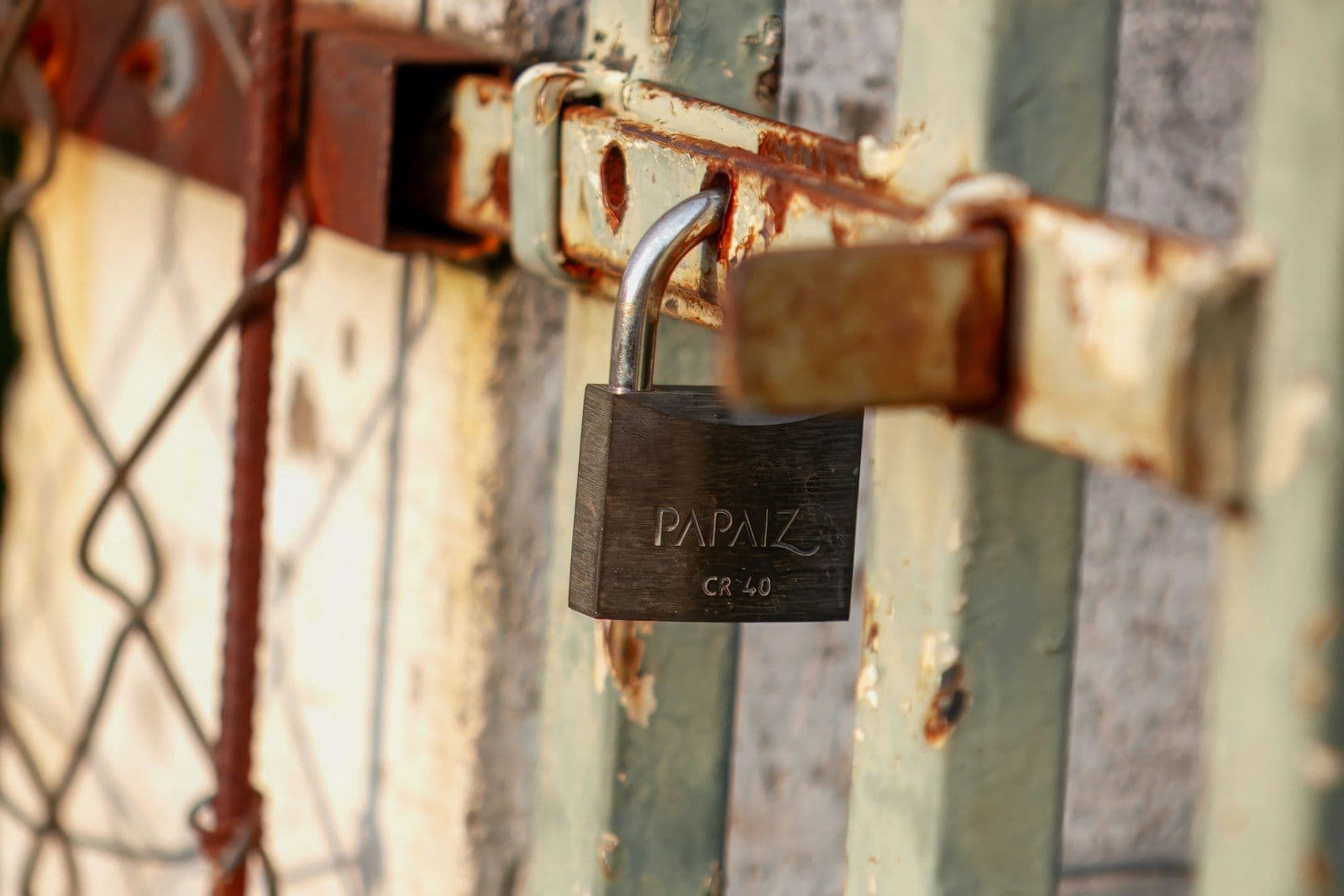 A padlocked gate, illustrating a credit application denial and the rights it triggers.