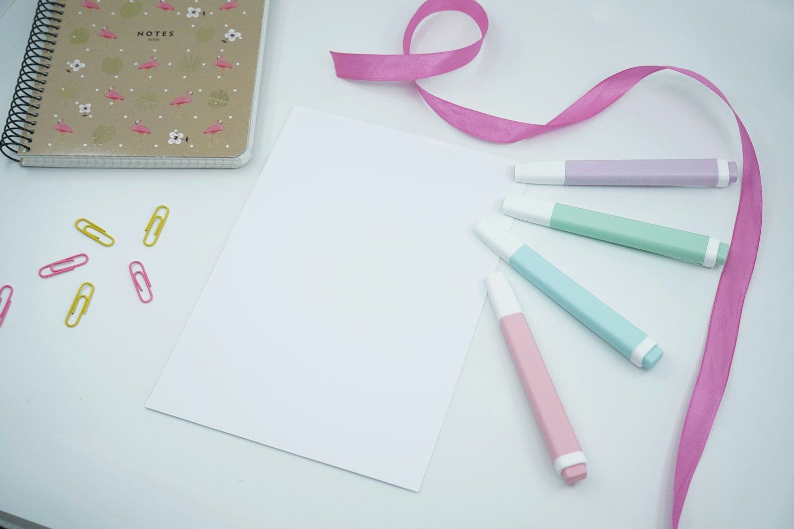 Pink ribbon on white paper, illustrating section 609 vs Section 611.