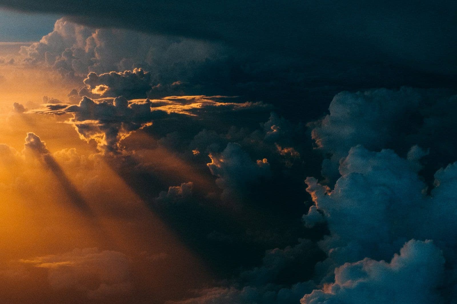Storm clouds breaking into sunlight, illustrating removing accurate negative credit items.