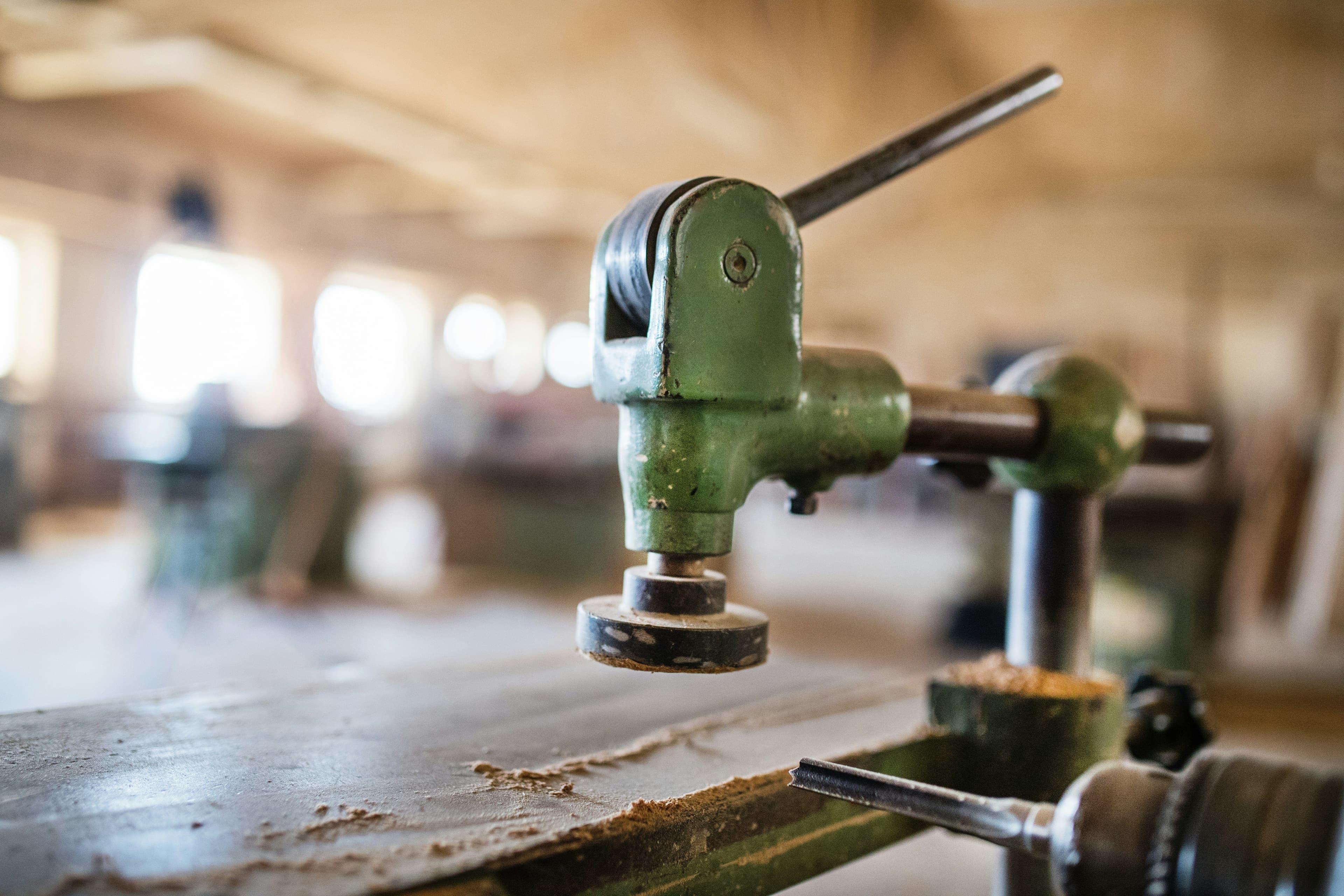Industrial woodworking machine in a workshop, illustrating the tools and steps for fixing bad credit